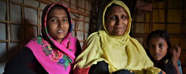 Rohingya refugee Ayesha with her daughters in her shelter in the camps in Cox's Bazar, Bangladesh. Credit: Maruf Hasan/Oxfam