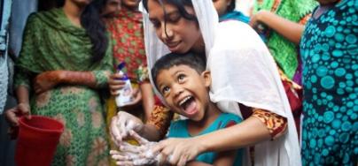 A teenage volunteer conducts hygiene promotion classes with her peers, Bangladesh