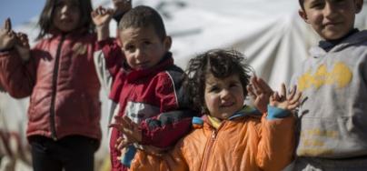 Syrian refugee children pose for a photograph for Oxfam's #withsyria campaign, Lebanon