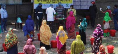 Hygiene kits distribution in Bangladesh with participants keep to social distance