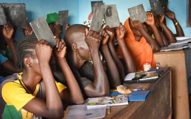 Survivors of gender-based and other types of violence learn how to write the letter “e” at the Women’s Home in Bria, Central African Republic. Godet, Oxfam