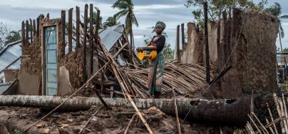 Masada Assani in what used to be her family’s house in Macomia, Mozambique. Cyclone Kenneth destroyed many houses in the town. Photo: Tommy Trenchard/Oxfam