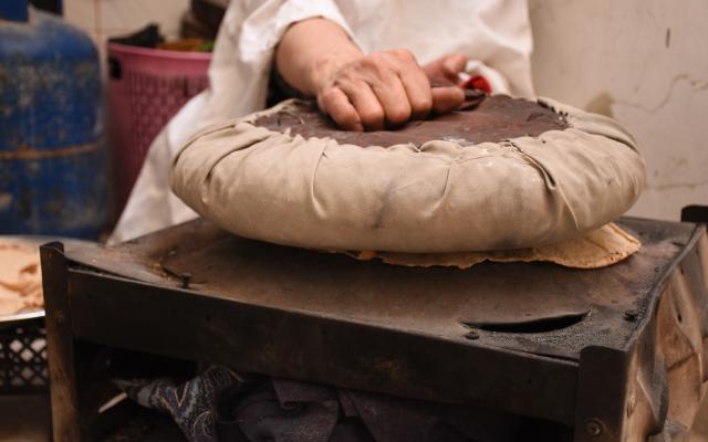 Najwa making bread, Harasta, Eastern Ghouta, Rural Damascus.