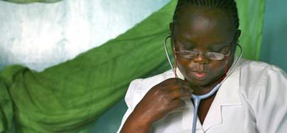 Enrolled Nurse, Miriam Chisizwa, at work in the post-natal ward at a public sector hospital in Lilongwe, Malawi. Photo: Abbie Trayler-Smith/Oxfam 2007