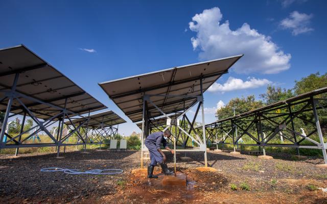 Nyathak Chuol fixing Oxfam constructed water point in Gambella ensuring Refugees in Gambella have access to water