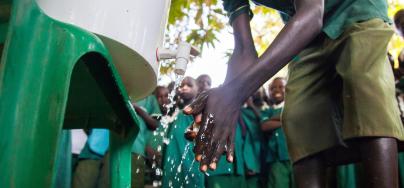 Students of the Primary Complex School in Gondokoro island, South Sudan, attend an awareness event organised by Oxfam to prevent cholera and inform about good hygienic practices.