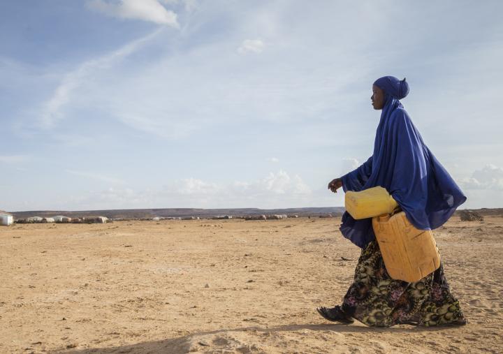 Ayan on her way to fetch water from a water well, in Somaliland.