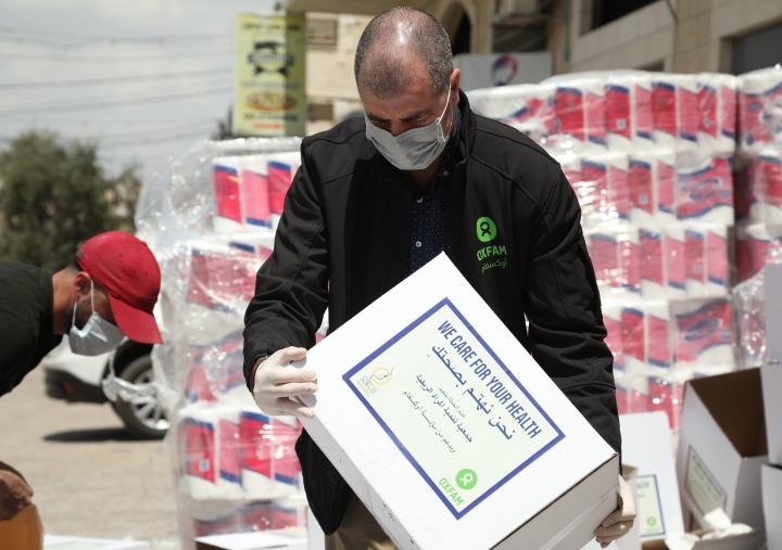 When COVID-19 started to spread in the West Bank, Occupied Palestinian Territory, Oxfam and its local partners distributed hygiene kits to families who couldn’t afford such materials. Photo: Suhaib Jarrar/Oxfam