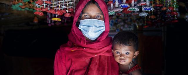 Nur Jahan* with her daughter Ismat* in her tent, Rohingya refugee camp, Cox's Bazar, Bangladesh