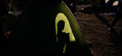 A child in the ‘Olive Grove’ section of the Moria ‘hotspot’ camp in Lesvos, Greece. Giorgos Moutafis/Oxfam