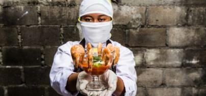 Melati showing that the shrimp cocktail that served for european class society, coming from her sweat, sacrifice to stay in the unconvenient dorm, lower minimum wage.