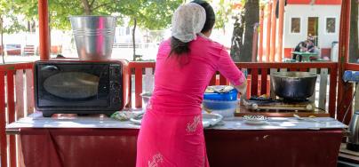 A makeshift kitchen has been established by residents outside at this refugee accommodation centre (RAC) in Moldova. 