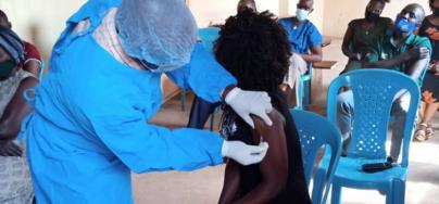 Vaccination of staff and clients of Hope of Children and Women Victims of Violence (HOCW), a refugee-led organization in Makindye Ssabagabo, Kampala. (John Bolingo Ntahira/HOCW)