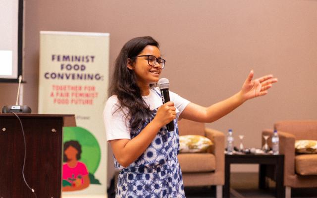 woman speaking at the Feminist Food Convening